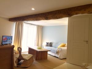 Maisons de vacances Un Figuier dans notre Jardin : photos des chambres