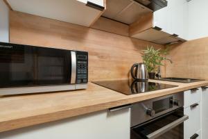 Przytulne Studio z Antresolą w Łodzi by Noclegi Renters