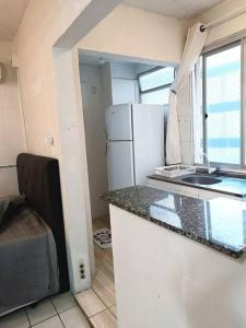 1 Quarto- Calçadão - Pé na areia