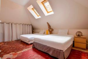 Appartements Demeure du XVIIIe avec Jacuzzi pres de Paris : photos des chambres