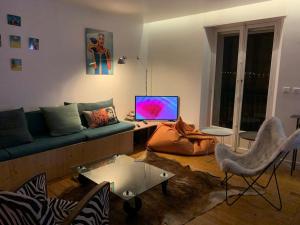 Appartements Les Pieds dans l eau : photos des chambres