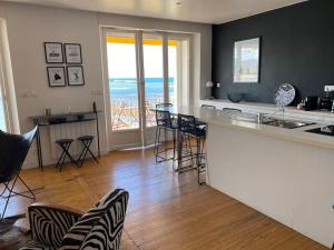 Appartements Les Pieds dans l eau : photos des chambres