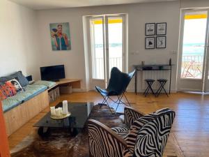 Appartements Les Pieds dans l eau : photos des chambres