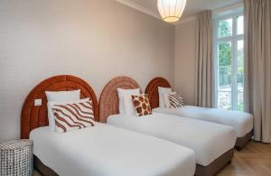 Appart'hotels L-Horloge - Appart-Hotel proche de Disneyland : Appartement Loft 4 Chambres