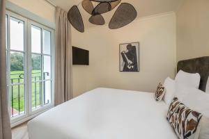 Appart'hotels L-Horloge - Appart-Hotel proche de Disneyland : photos des chambres