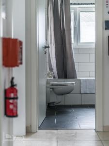 Voll ausgestattete Apartments mit Einzelbetten - Küche - WLAN - PKW-Parkplatz