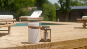 Villas Maison avec terrasse en bois et piscine : photos des chambres