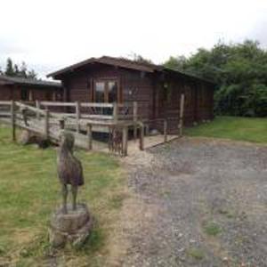 Hand built log cabin at Avonvale Holiday Lodges