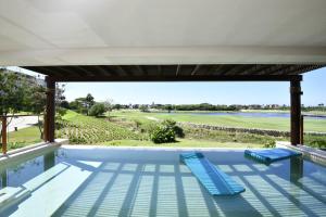 Condo Azul in El Encanto - Spacious Condo with Golf Views, Pool & Cart, Punta Mita