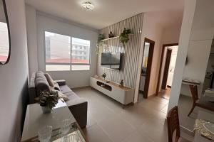 Apartamento na praia, 2 quartos e área de lazer