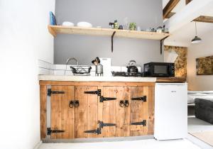 Appartements Maison Secrete Studio Apartment : photos des chambres