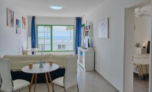 TOP FLOOR OCEAN VIEWS Lanzamar - Renovated Gem with a Sunny, Private Terrace & Elevator & Pool - Puerto del Carmen