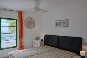 TOP FLOOR OCEAN VIEWS Lanzamar - Renovated Gem with a Sunny, Private Terrace & Elevator & Pool - Puerto del Carmen