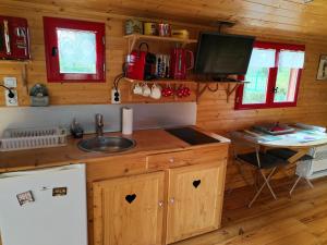 Maisons de vacances Roulotte atypique calme au milieu de la verdure : photos des chambres
