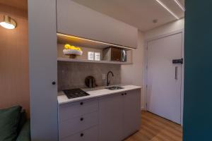 EDIFICIO UP - Loft próximo a Vila Germânica e FURB com vaga.