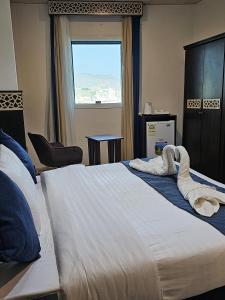 فندق سواعد العالمية