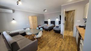 Wrzosowe Wzgórze 5 - Apartamenty