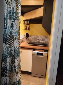 Appartements petit studio cosy : photos des chambres