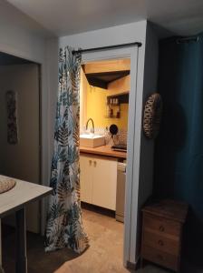 Appartements petit studio cosy : photos des chambres