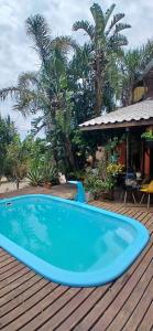 BelĂssima casa de praia com piscina