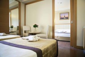 Quadruple Room room in Baron Hotel