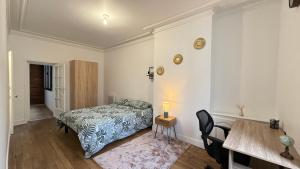Appartements Le carmes - Retroprojecteur - Hypercentre Orleans : photos des chambres