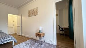 Appartements Le carmes - Retroprojecteur - Hypercentre Orleans : photos des chambres