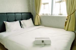 Minimalist and Comfort Living 2BR at Signature Park Grande Apartment By Travelio