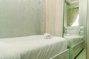 Minimalist and Comfort Living 2BR at Signature Park Grande Apartment By Travelio