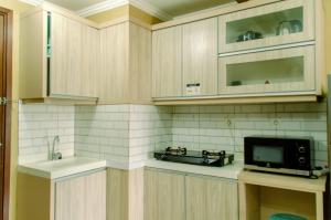 Minimalist and Comfort Living 2BR at Signature Park Grande Apartment By Travelio