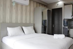 Cozy Studio Apartment at Mekarwangi Square Cibaduyut By Travelio