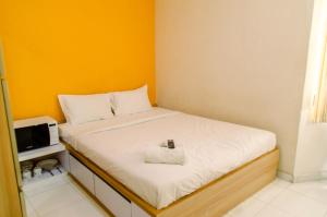 Cozy Living Studio Apartment No Kitchen Aeropolis Residence By Travelio