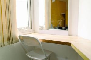 Cozy Living Studio Apartment No Kitchen Aeropolis Residence By Travelio