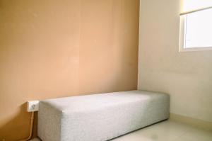 Comfort and Simple 2BR at Green Pramuka City Apartment By Travelio