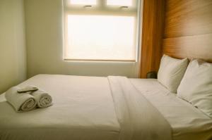 Comfort and Simple 2BR at Green Pramuka City Apartment By Travelio
