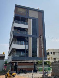 Athidi Luxury Home Stay - AC 2BHK Fully Furnished Flat with TV, WI-FI, 24Hrs Hot water, Parking, Elevator, Power Backup