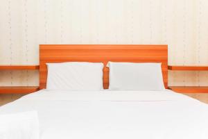 Cozy Studio at Bassura City Apartment By Travelio