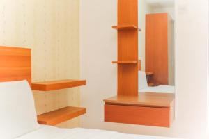 Cozy Studio at Bassura City Apartment By Travelio