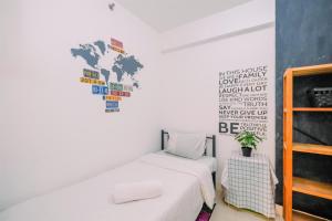 Warm and Cozy 2BR at Low Floor Bassura City Apartment By Travelio