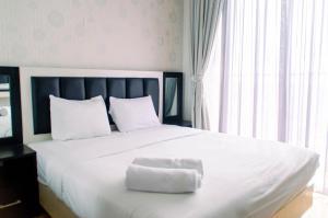 Comfy and Relax 2BR at Mangga Dua Apartment By Travelio