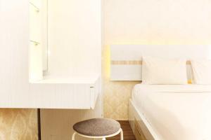 Comfort Living 1BR at Grand Sentraland Karawang Apartment By Travelio