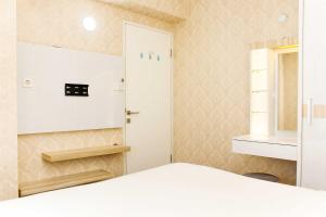 Comfort Living 1BR at Grand Sentraland Karawang Apartment By Travelio