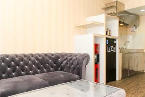 Comfort Living 1BR at Grand Sentraland Karawang Apartment By Travelio