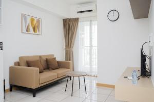 Nice and Fresh 2BR Apartment at M-Town Residence By Travelio