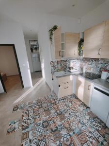 Appartements Maisonnette - Charme Coeur de Vigne : photos des chambres