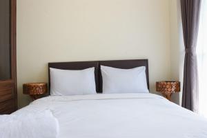 Nice and Cozy Studio at Tifolia Apartment By Travelio