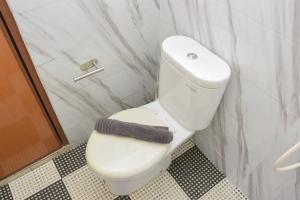 Nice and Cozy Studio at Tifolia Apartment By Travelio