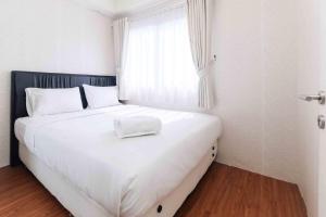 Comfort and Simple 2BR at Pakubuwono Terrace Apartment By Travelio