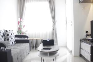 Pleasant 2BR at Grand Asia Afrika Apartment By Travelio