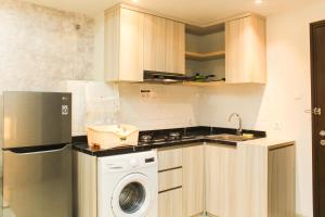 Modern and Spacious Studio Apartment at Mustika Golf Residence By Travelio